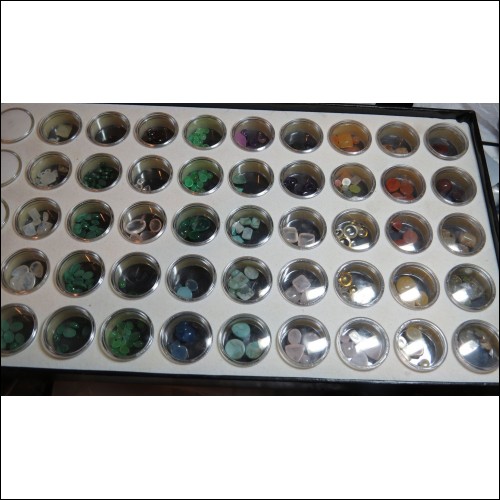 TRAY OF STONES- 50 CAPSULES OF DIFFERENT COLOR STONES $1NR
