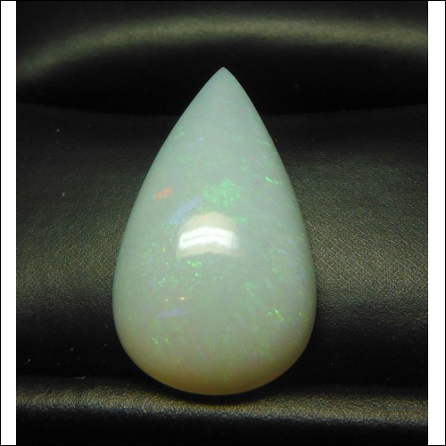 9.04CT PEAR SHAPE OPAL WITH RED BLUE GREEN $1NR- OCTOBER BIRTHSTONE