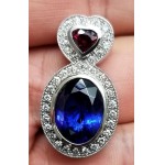 Sold 11.41Ct Tanzanite Ruby and Diamond Pendant 18kwg
