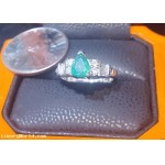 Defaulted Pawn Loan or Buy an approximately 1.20Ctw Emerald and Diamond Ring 14k White Gold